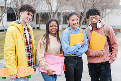 4 students smiling