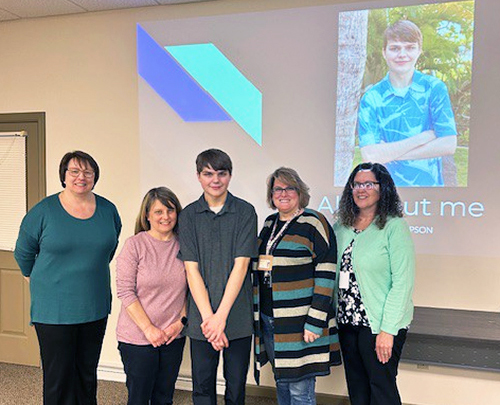 Youth Ambassador, Jason, pictured with other school representatives